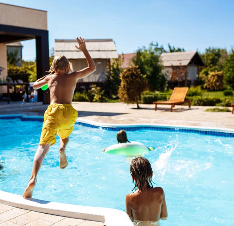 people enjoying a pool